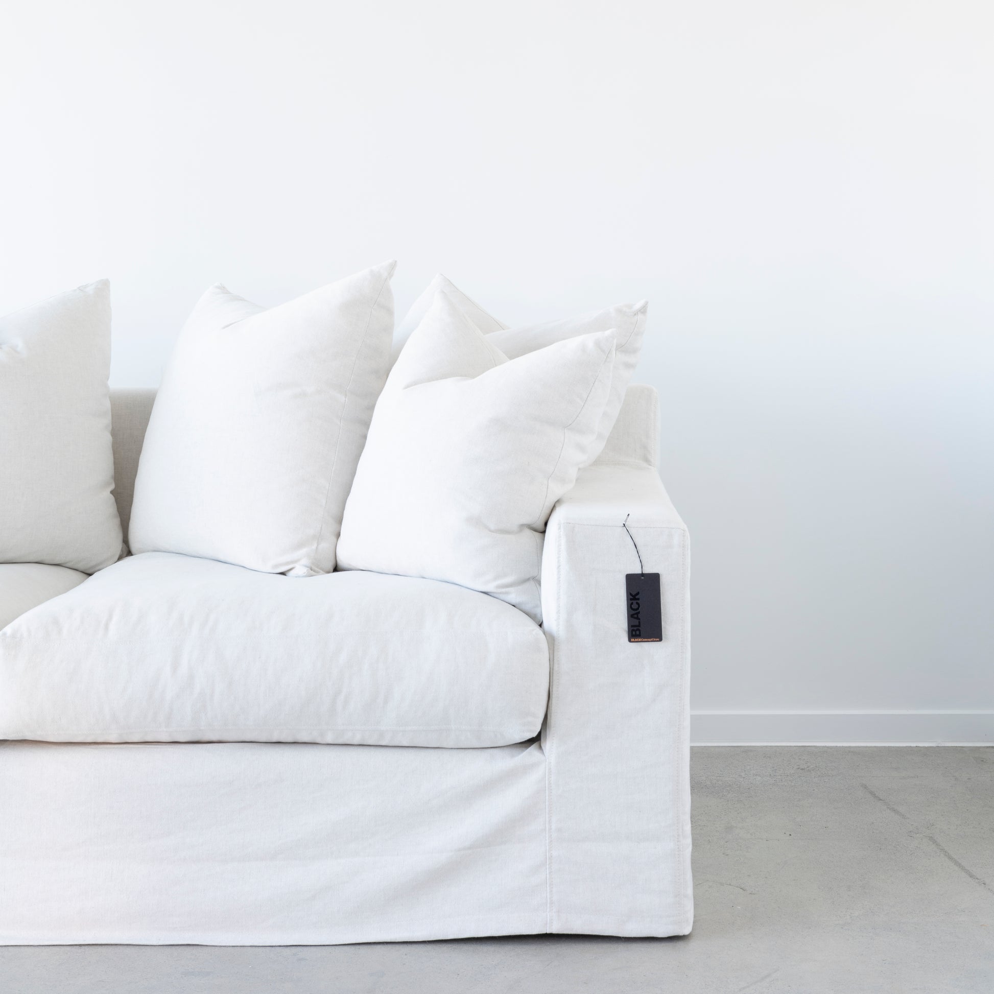 Comfortable 3.5 seater sofa with plush cushions and removable cover