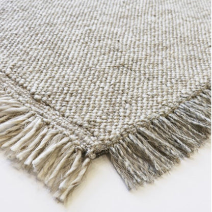 Two-tone fringing floor rug